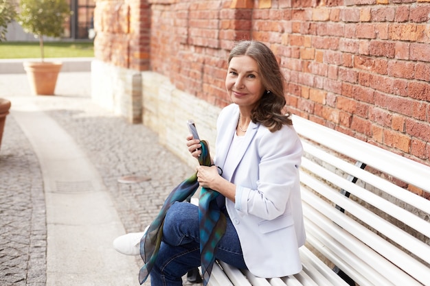 Expressive senior woman posing