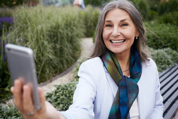 Expressive senior woman posing