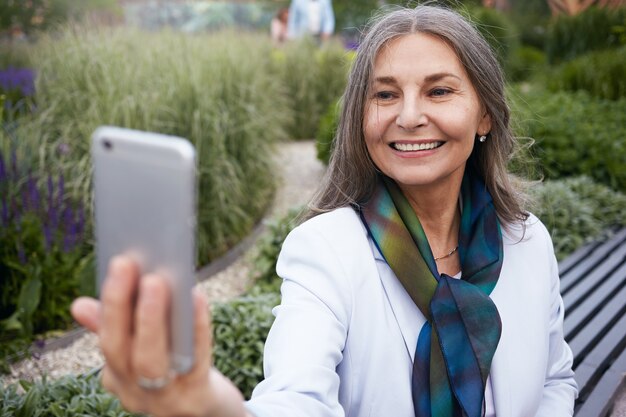 Expressive senior woman posing