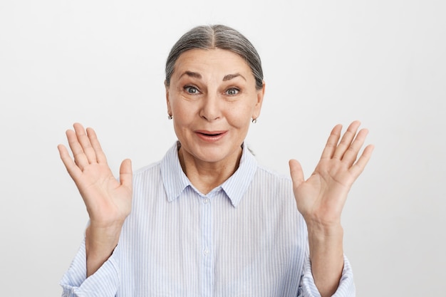 Expressive senior woman posing