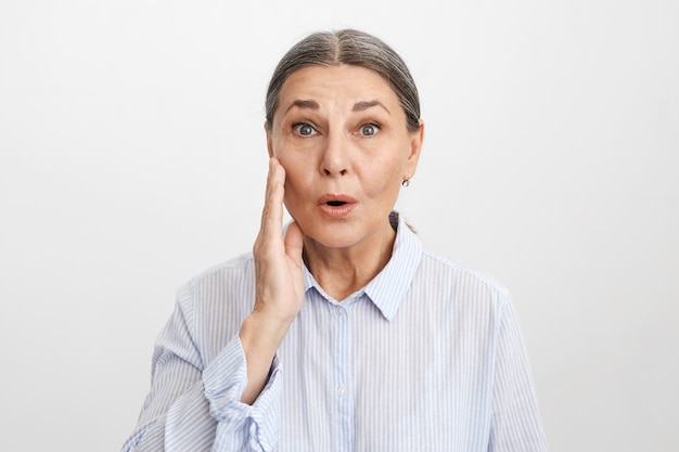 Expressive senior woman posing