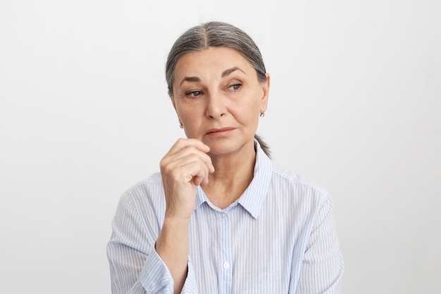 Expressive senior woman posing