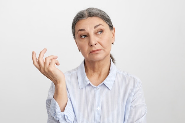 Expressive senior woman posing