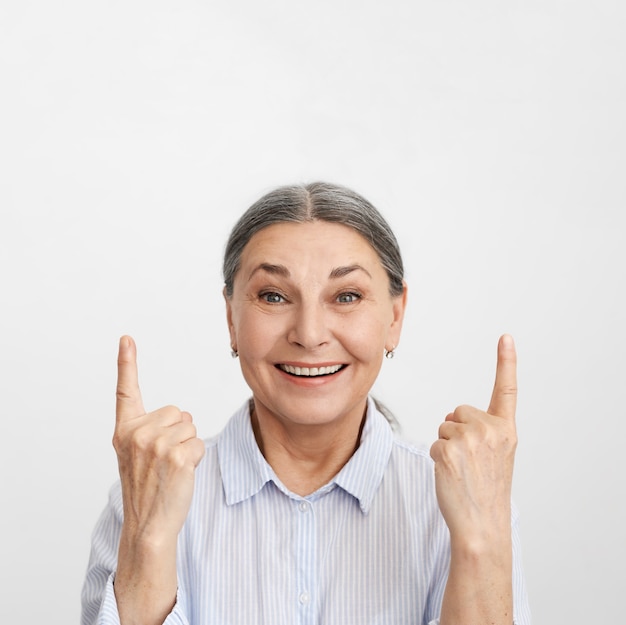 Expressive senior woman posing