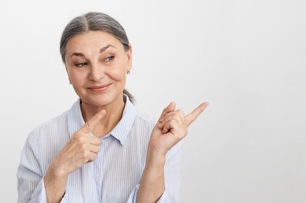 Expressive senior woman posing