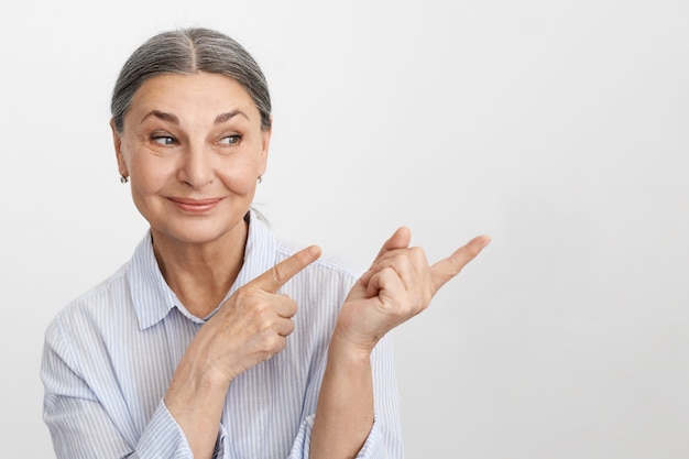 Expressive senior woman posing