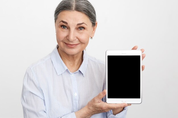 Expressive senior woman posing