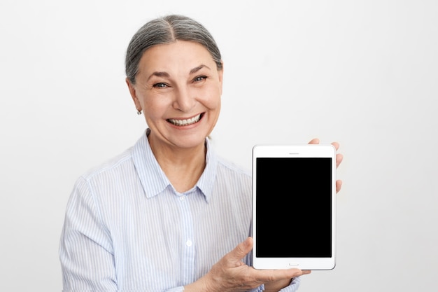 Expressive senior woman posing