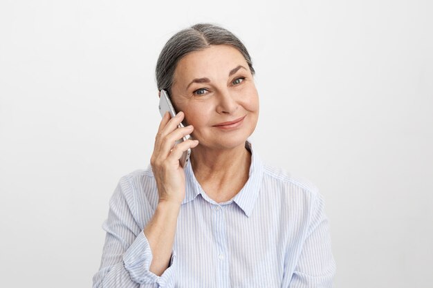 Expressive senior woman posing