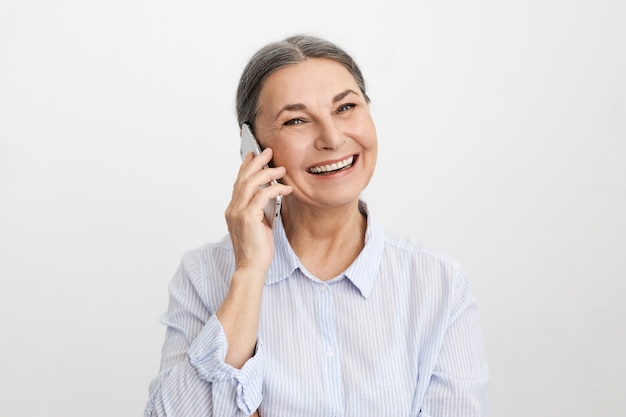 Expressive senior woman posing