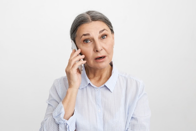 Expressive senior woman posing