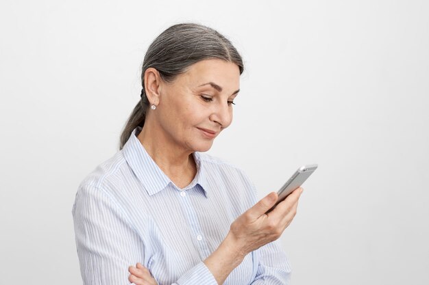 Expressive senior woman posing