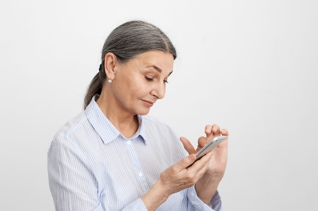 Expressive senior woman posing