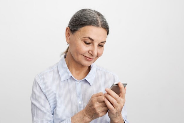 Expressive senior woman posing