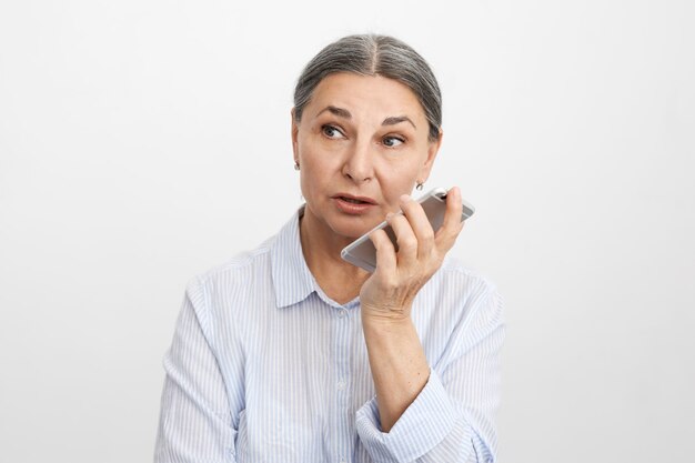 Expressive senior woman posing