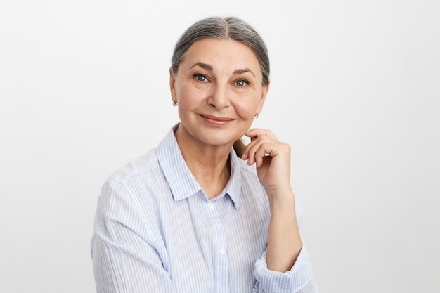 Expressive senior woman posing