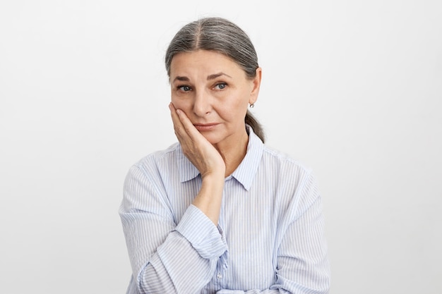 Expressive senior woman posing