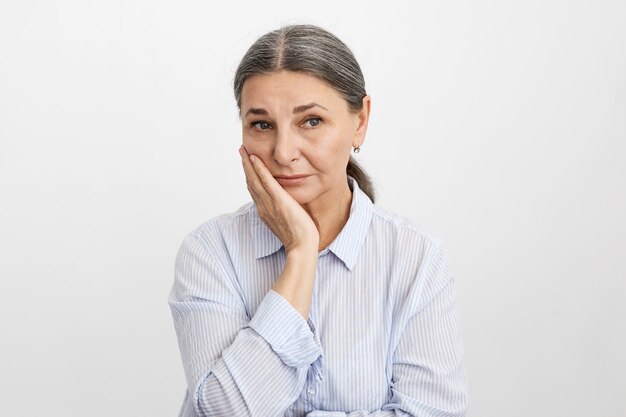 Expressive senior woman posing