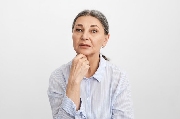 Expressive senior woman posing