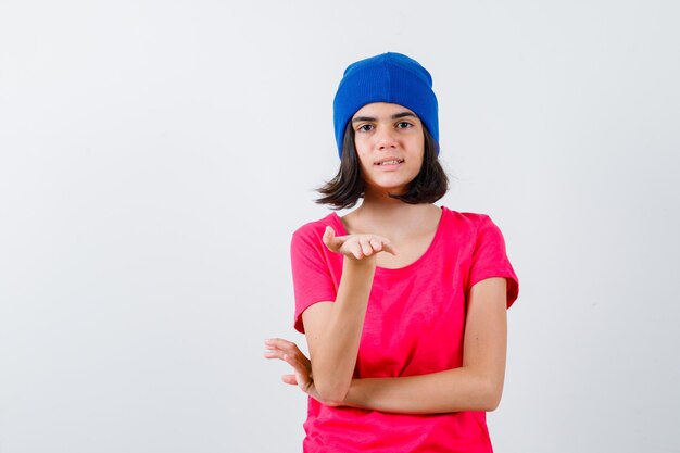 An expressive teenage girl is posing