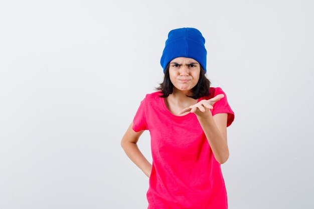 An expressive teenage girl is posing