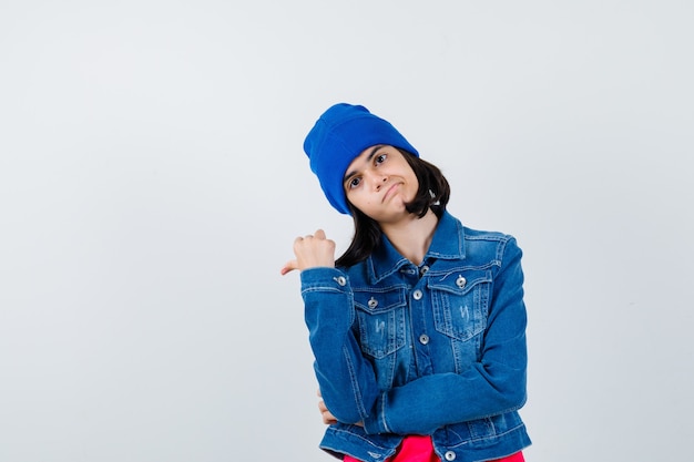 An expressive teenage girl is posing