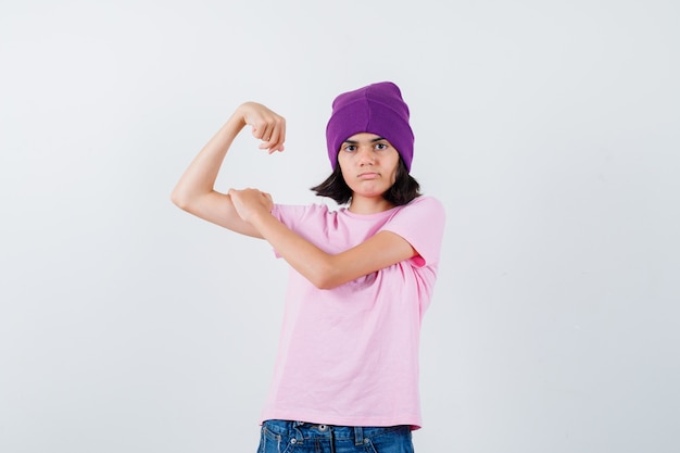 An expressive teenage girl is posing