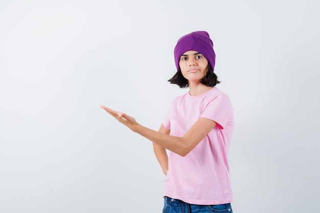 An expressive teenage girl is posing