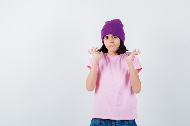 An expressive teenage girl is posing