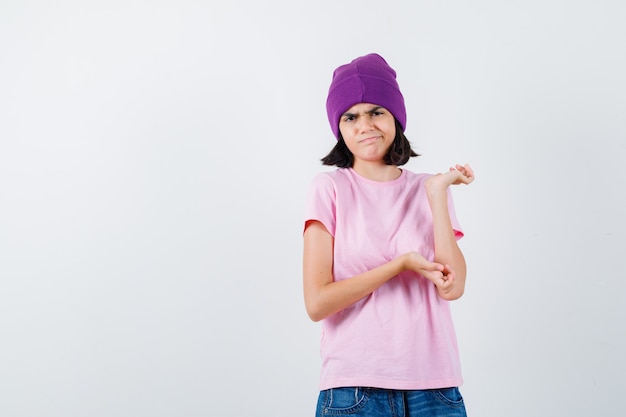 An expressive teenage girl is posing