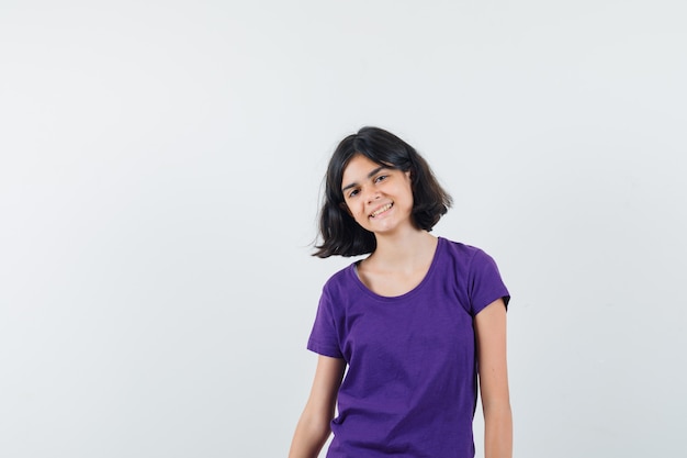 An expressive woman is posing in the studio