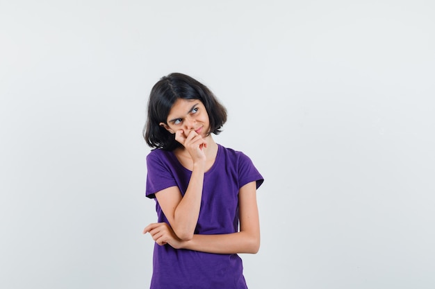 An expressive woman is posing in the studio