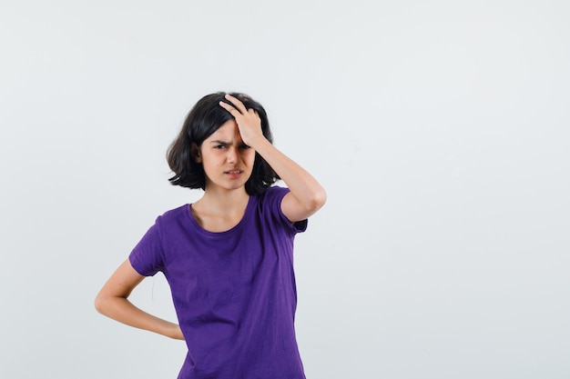 An expressive woman is posing in the studio