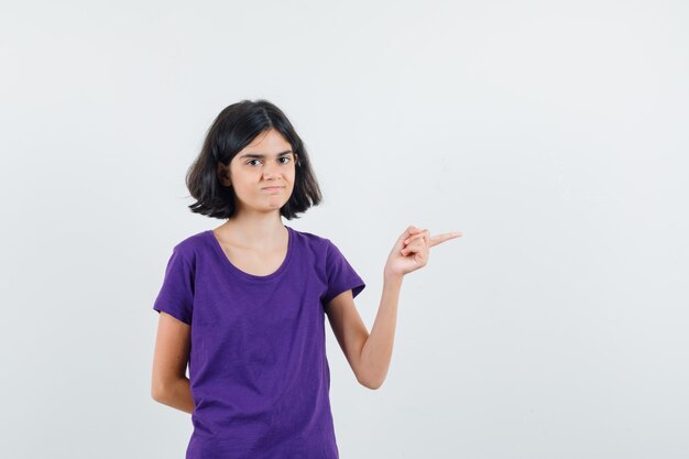 An expressive woman is posing in the studio