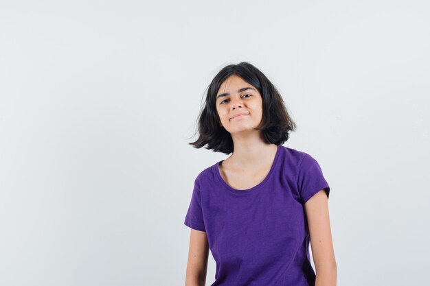 An expressive woman is posing in the studio