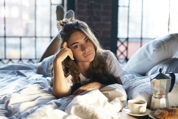 Expressive woman posing indoor