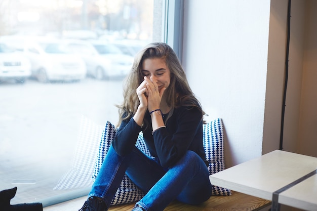 Expressive woman posing indoor