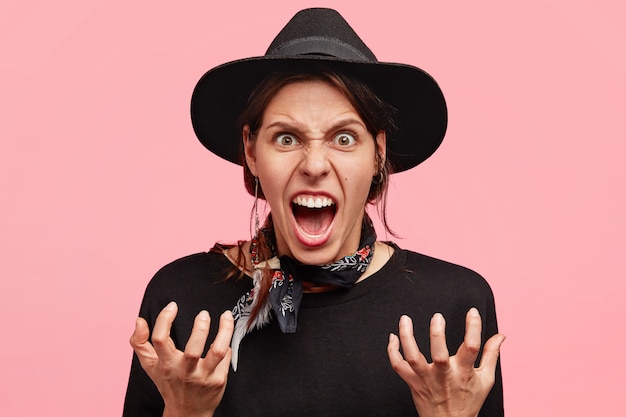 Expressive woman wearing all black clothes