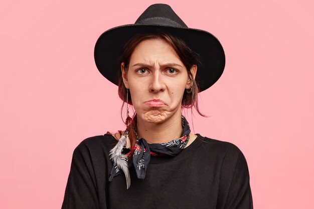 Expressive woman wearing all black clothes