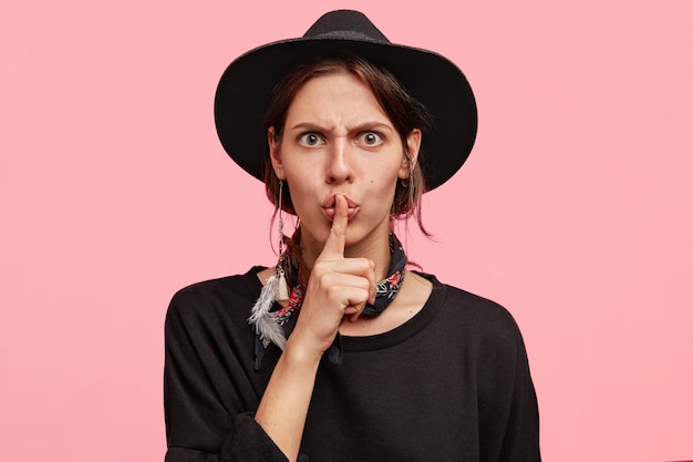 Expressive woman wearing all black clothes