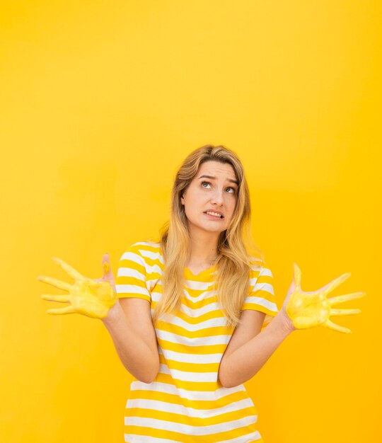 Expressive woman with painted hands