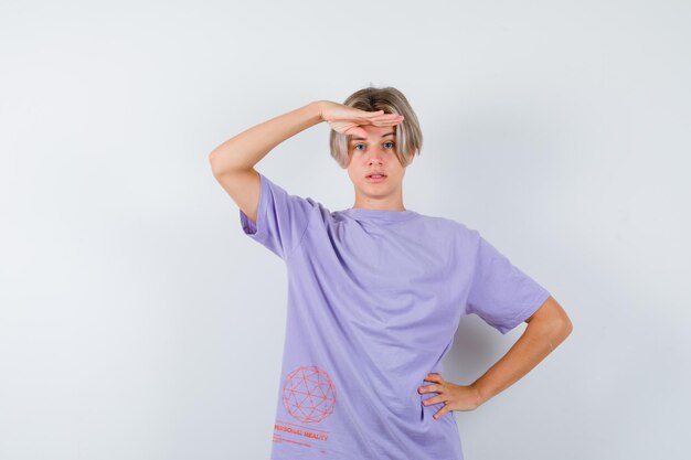 Expressive young boy posing in the studio