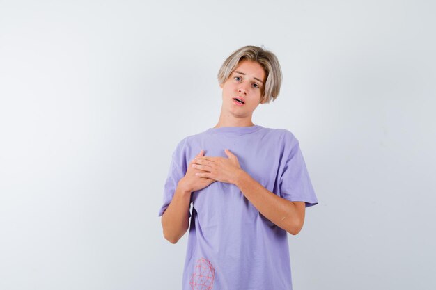 Expressive young boy posing in the studio