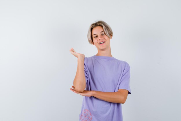 Expressive young boy posing in the studio