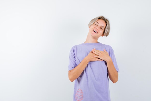 Expressive young boy posing in the studio