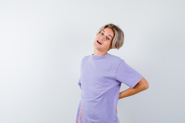 Expressive young boy posing in the studio