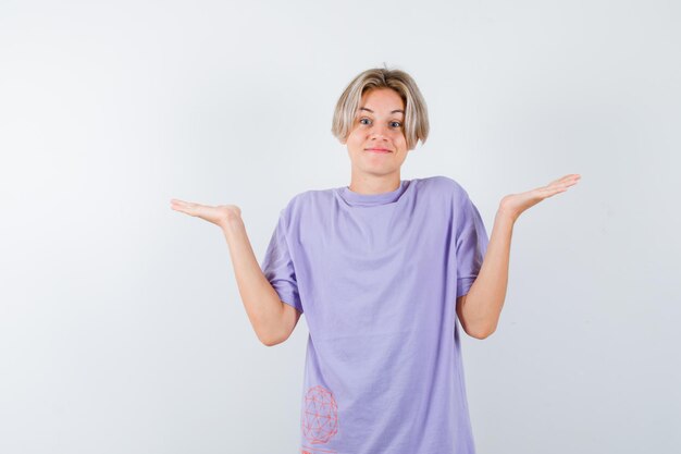 Expressive young boy posing in the studio