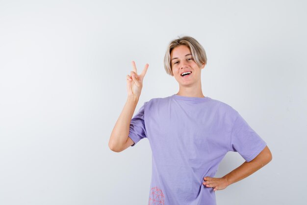 Expressive young boy posing in the studio