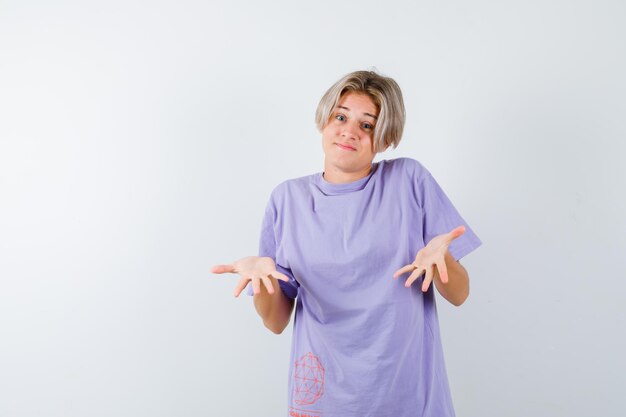 Expressive young boy posing in the studio