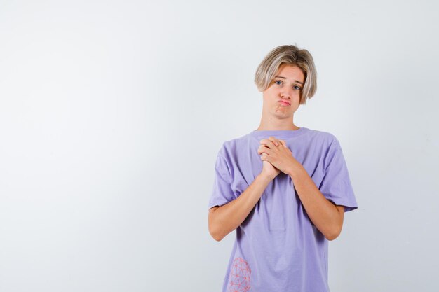 Expressive young boy posing in the studio